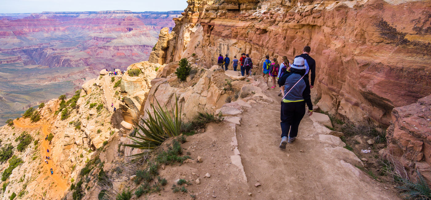 Image: Hiking the Grand Canyon. (Photo Credit: maislam/Adobe)