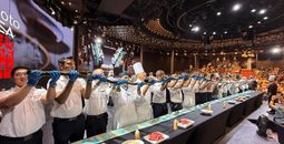 Chef Masaharu Morimoto helped created the world's longest maki sushi roll aboard Rotterdam