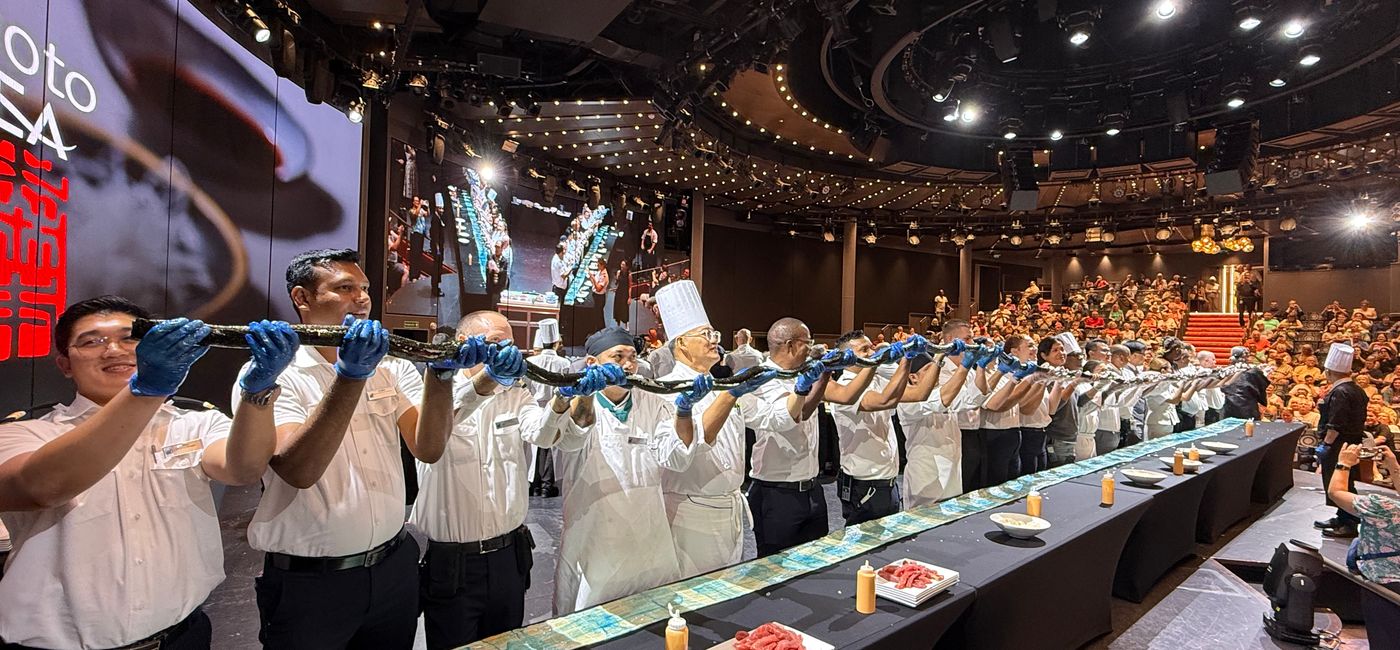 Image: Chef Masaharu Morimoto helped created the world's longest maki sushi roll aboard Rotterdam (Photo Credit: Holland America Line)