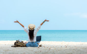 Female working on the beach, laptop, work, travel,