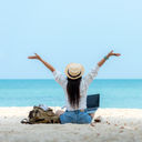 Female working on the beach, laptop, work, travel,