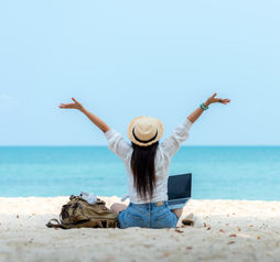 Female working on the beach, laptop, work, travel,