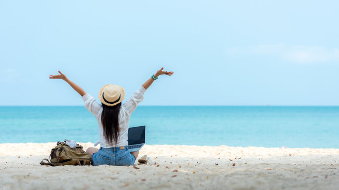 Woman working on the beach Female working on the beach, laptop, work, travel,