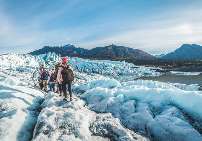 Group hiking the Matanuska Glacier in Alaska. Group hiking the Matanuska Glacier in Alaska.