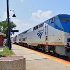 Amtrak train parked at a station.