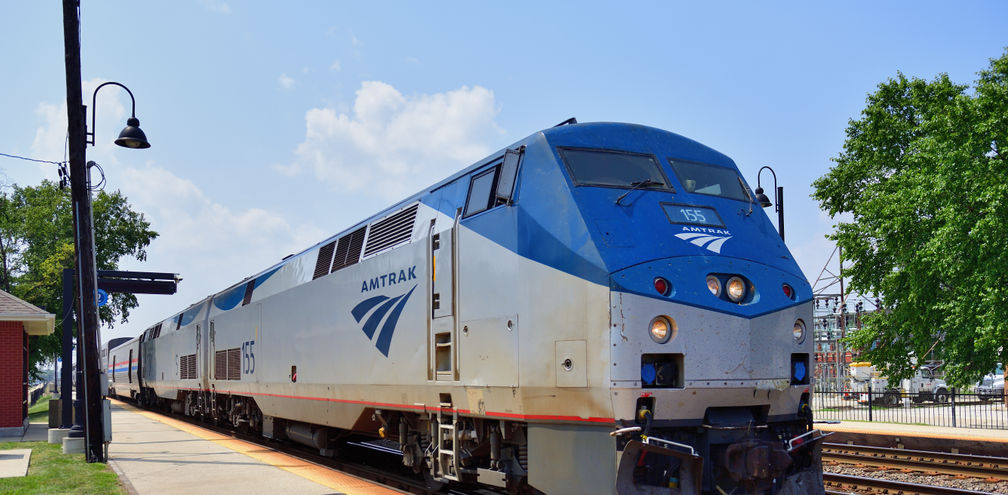 Amtrak train parked at a station.
