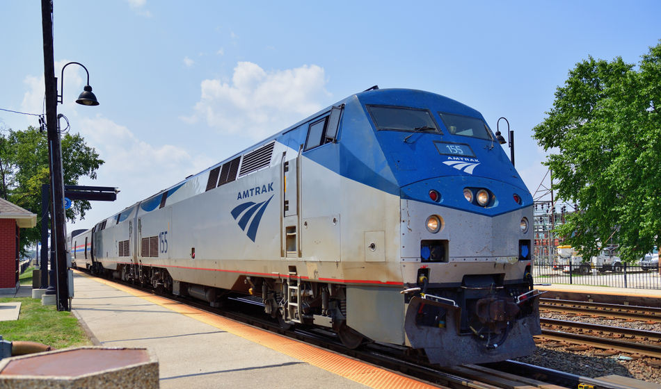 Amtrak train parked at a station.