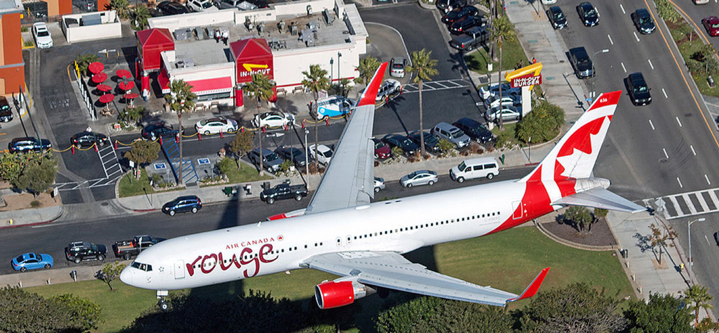 Image: PHOTO: Air Canada Rouge, 767-300, landing at LAX. (photo via Flickr/Chris Hall)