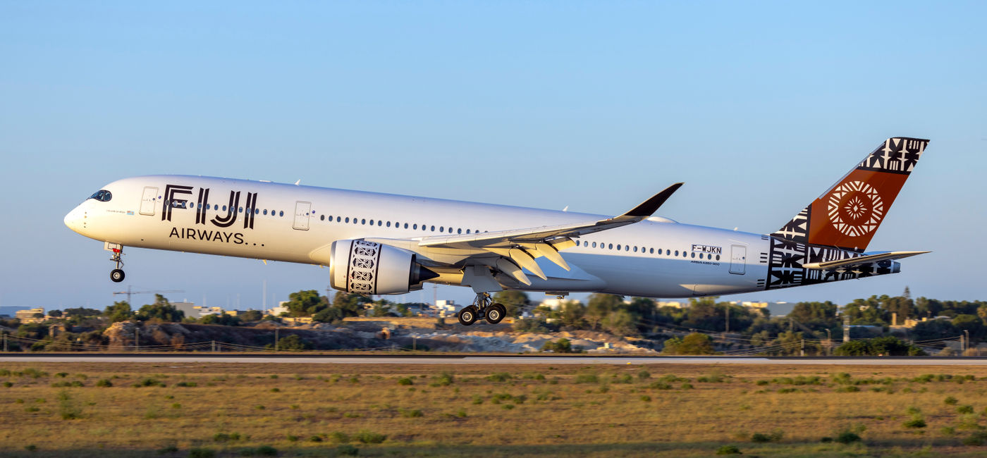 Image: A Fiji Airways airplane. (Photo Credit: Adobe Stock/gordzam)