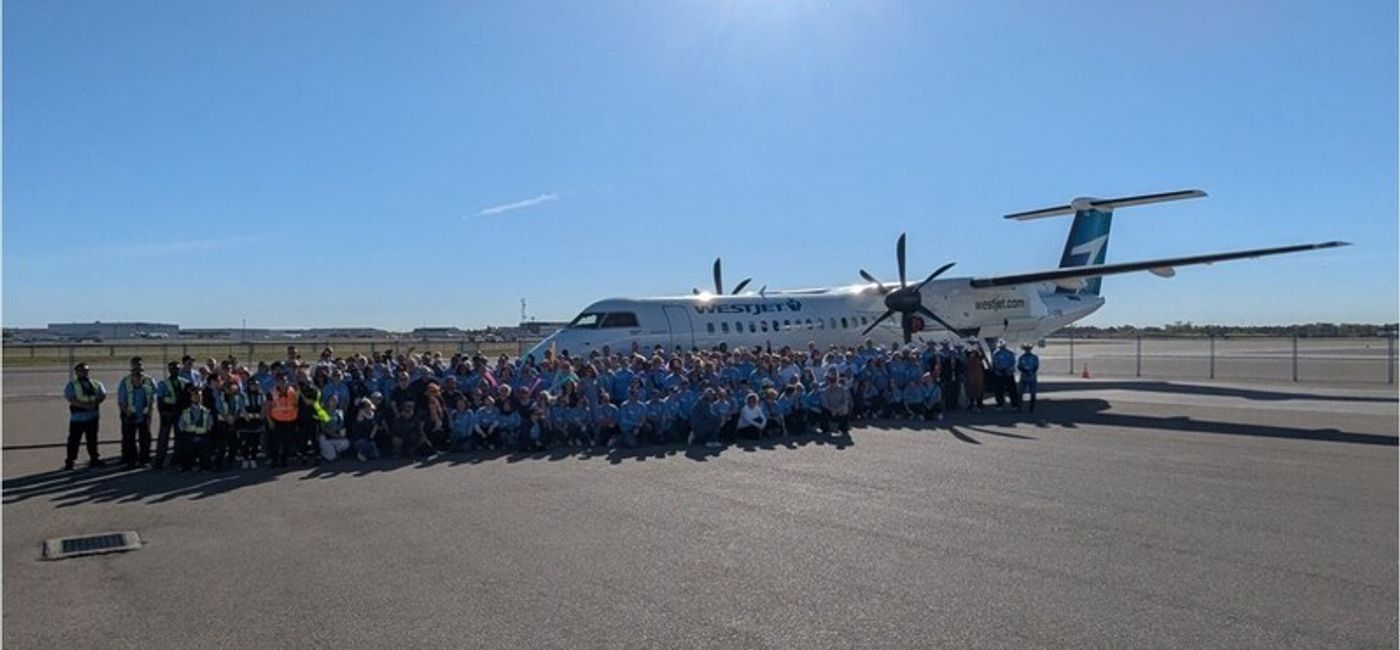 Image: WestJetters pull plane in Calgary for Hope Air (Photo Credit: WestJet)