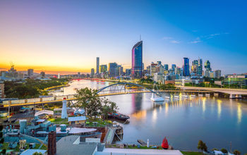 The city skyline of Brisbane, Australia at twilight.