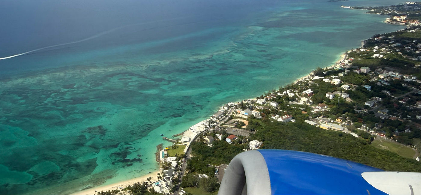 Image: The Bahamas' tropical Caribbean waters and beaches are seen right after takeoff from Lynden Pindling International Airport in Nassau. (Photo Credit: Photo by Paul J. Heney.)