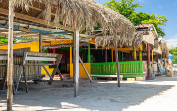 Thatched roofs along Seven Mile Beach, Negril