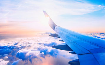 View over the wing of an airplane in flight.