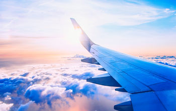 View over the wing of an airplane in flight.