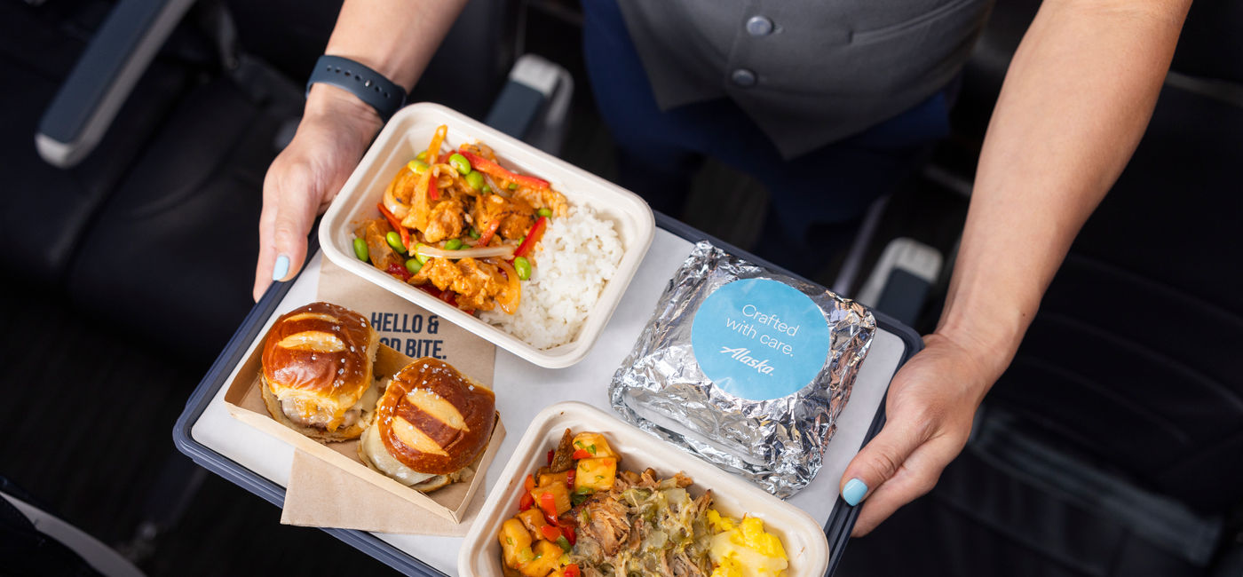 Image: Long-haul travelers in Premium and Main cabin on Alaska Airlines flights can now purchase hot meals. (Photo Credit: Alaska Airlines)