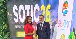 CTO Secretary-General and CEO Dona Regis-Prosper congratulates Antigua and Barbuda Minister of Tourism Charles “Max” Fernandez.