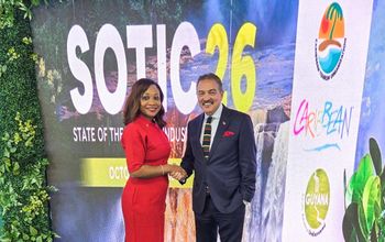 CTO Secretary-General and CEO Dona Regis-Prosper congratulates Antigua and Barbuda Minister of Tourism Charles “Max” Fernandez.