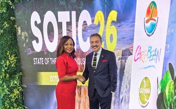 CTO Secretary-General and CEO Dona Regis-Prosper congratulates Antigua and Barbuda Minister of Tourism Charles “Max” Fernandez.