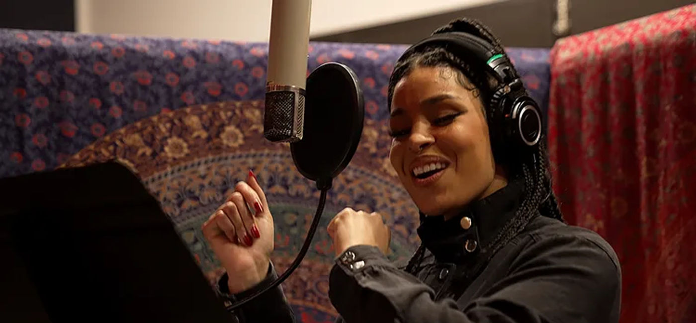 Image: Jordin Sparks sings "Live the Adventure," the new signature song for Disney Treasure (Photo Credit: Disney Cruise Line)