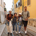 gen z travelers, young adult travelers, friend travelers, group travel, lisbon, portugal travel