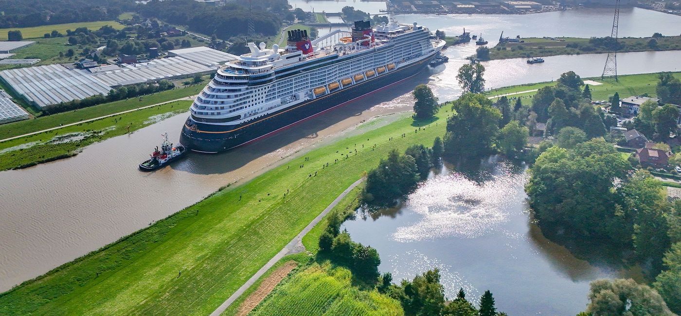 Image: Disney Treasure on the Ems River (Photo Credit: Disney Cruise Line)