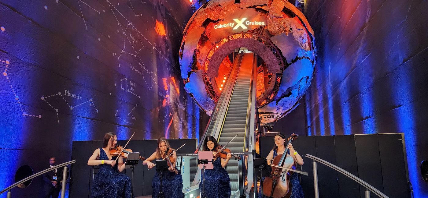 Image: String quartet plays at the Celebrity Cruises 2025 President's Cruise pre-voyage gala event in London, UK. (Photo Credit: Northstar Travel Group/Laurie Baratti)