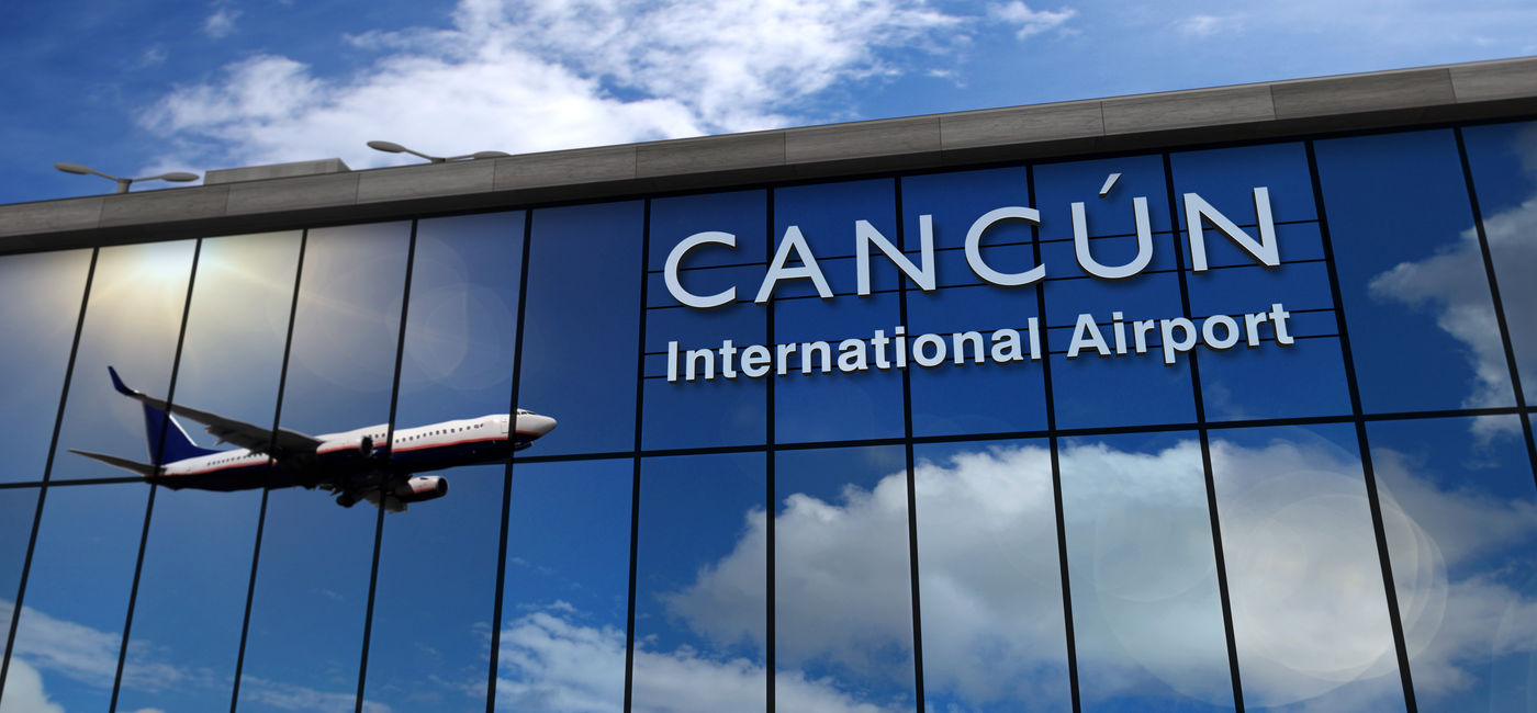 Image: Airplane landing at Cancun International Airport. (Photo Credit: Skórzewiak / Adobe Stock)