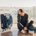Frustrated traveler waiting for flight
