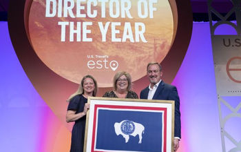 Diane Shober, executive director for the Wyoming Office of Tourism, receives the award of 2025 State Tourism Director of the Year
