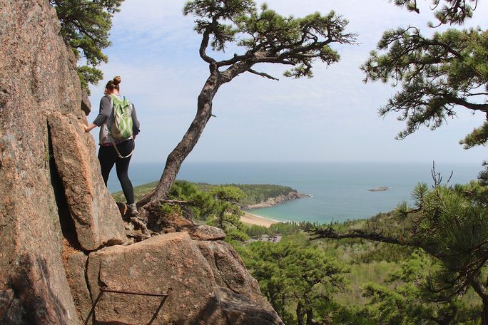 Hiker on the Beehive Loop Trail in Acadia National Park Beehive Loop, Acadia National park, hiking trail, Maine