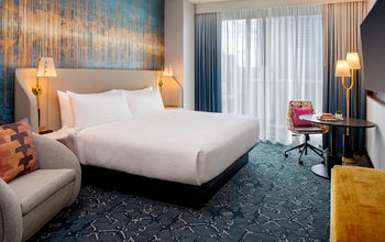A standard king guest room at the Tempo by Hilton Nashville Downtown, which opened in February.