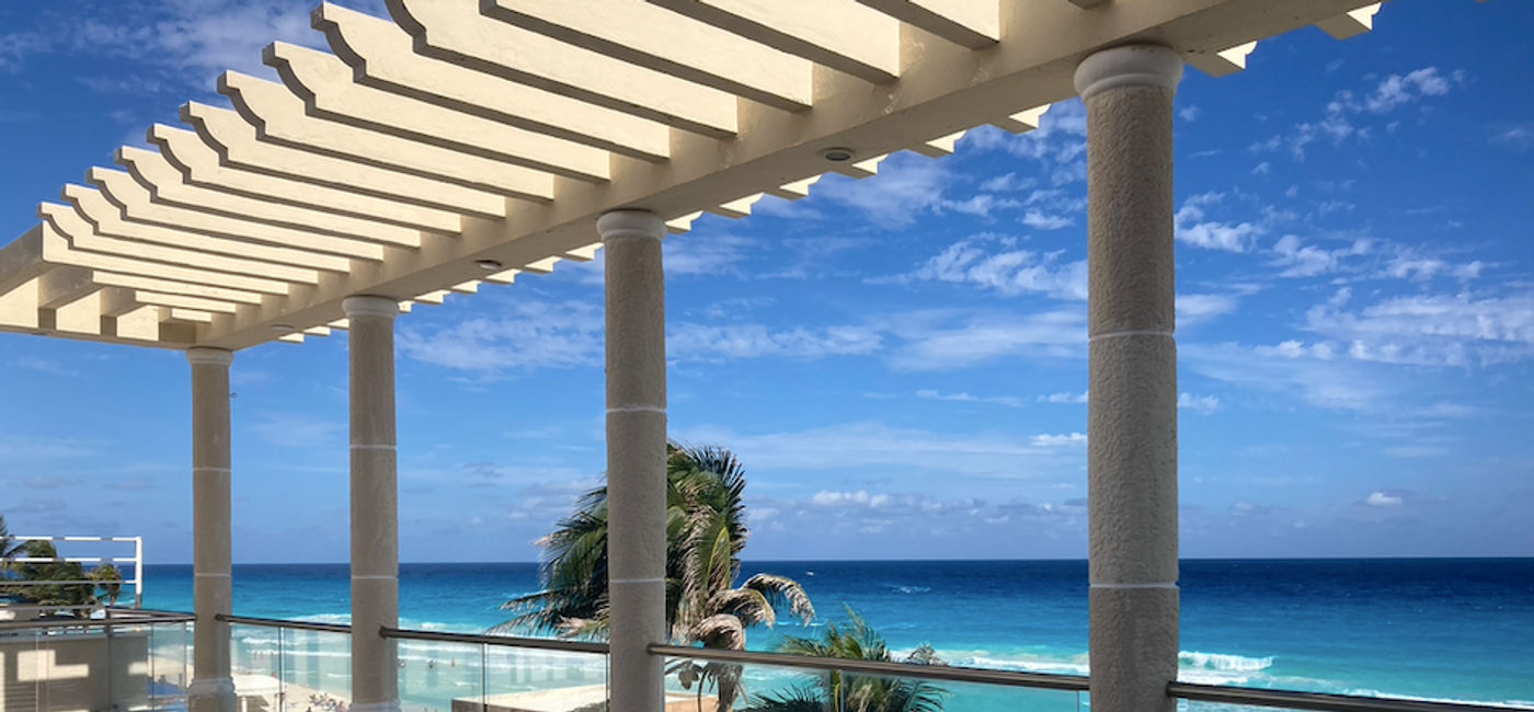 Image: Rooftop wedding area overlooking the ocean. (Photo Credit: Marsha Mowers)