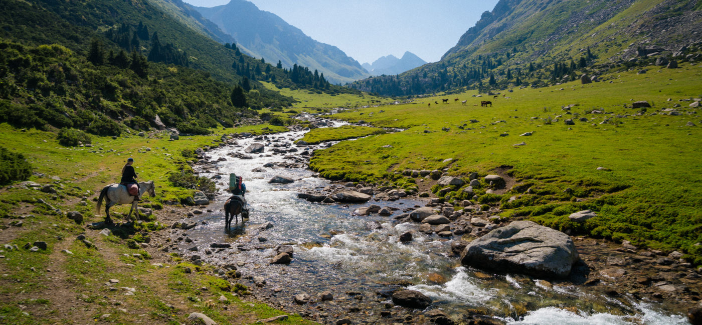 Image: The Tien Shen mountain range in Kyrgyzstan is one of Intrepid Travel's 10 'Not Hot' Locations for 2026. (Photo Credit: Courtesy Intrepid Travel, Liz Carlson)