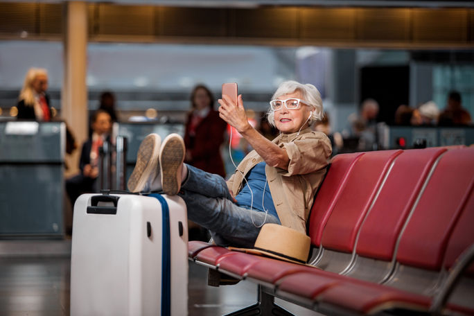 Elderly woman solo travel, female, traveler, airport, lounge