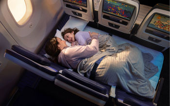 Parent and child lay in United Relax Row