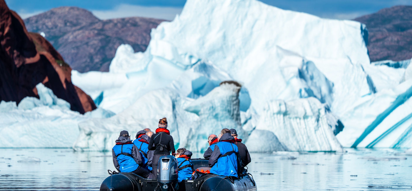 Image: An Aurora Expeditions Zodiac group near icebergs in Greenland. (photo via Tyson Mayr) (Photo Credit: (photo via Tyson Mayr))