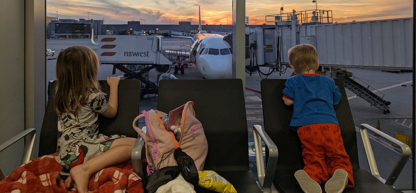 Image: Kids waiting at the airport (Photo Credit: Eric Bowman)