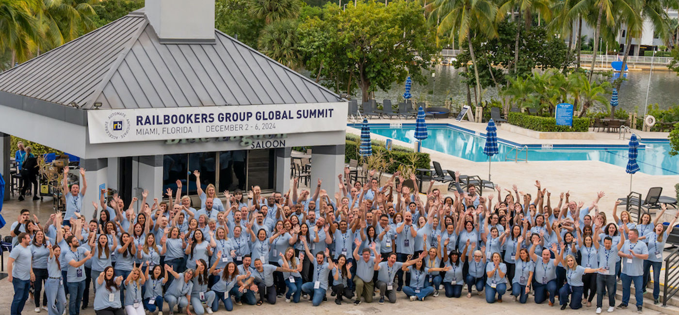 Image: Group shot of the second-annual Railbookers Global Summit. (Photo Credit: Railbookers)