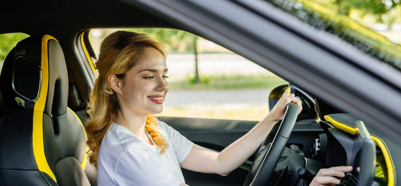 Image: Travelers don't want to take a road trip without the perfect playlist. (Photo Credit: Adobe/wedmoments.stock)