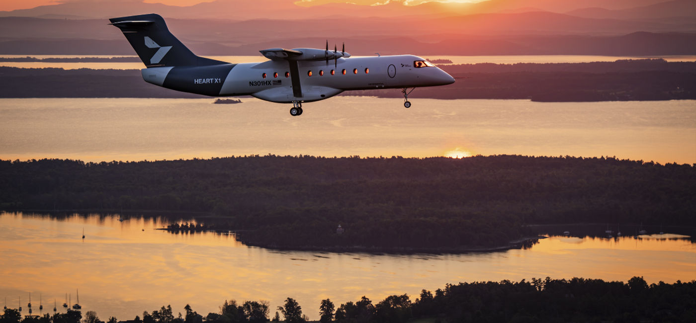 Image: Heart Aerospace’s X1 demonstrator aircraft flies toward the rising sun above upstate New York’s Champlain Valley during its first flight. (Photo Credit: Heart Aerospace)