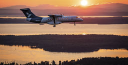 Heart Aerospace’s X1 demonstrator aircraft flies toward the rising sun above upstate New York’s Champlain Valley during its first flight