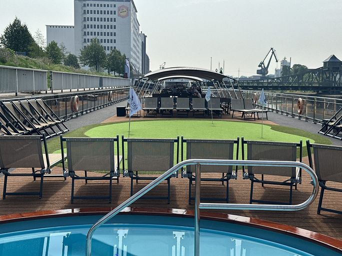 Riviera's MS Geoffrey Chaucer sundeck with a splash pool and putting green. Riviera's MS Geoffrey Chaucer sundeck with a splash pool and putting green.