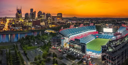 Nissan Stadium with city skyline in Nashville, Tennessee