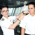 Captain Francesco Bencivenga places the epaulettes on Daniela Gargiulo