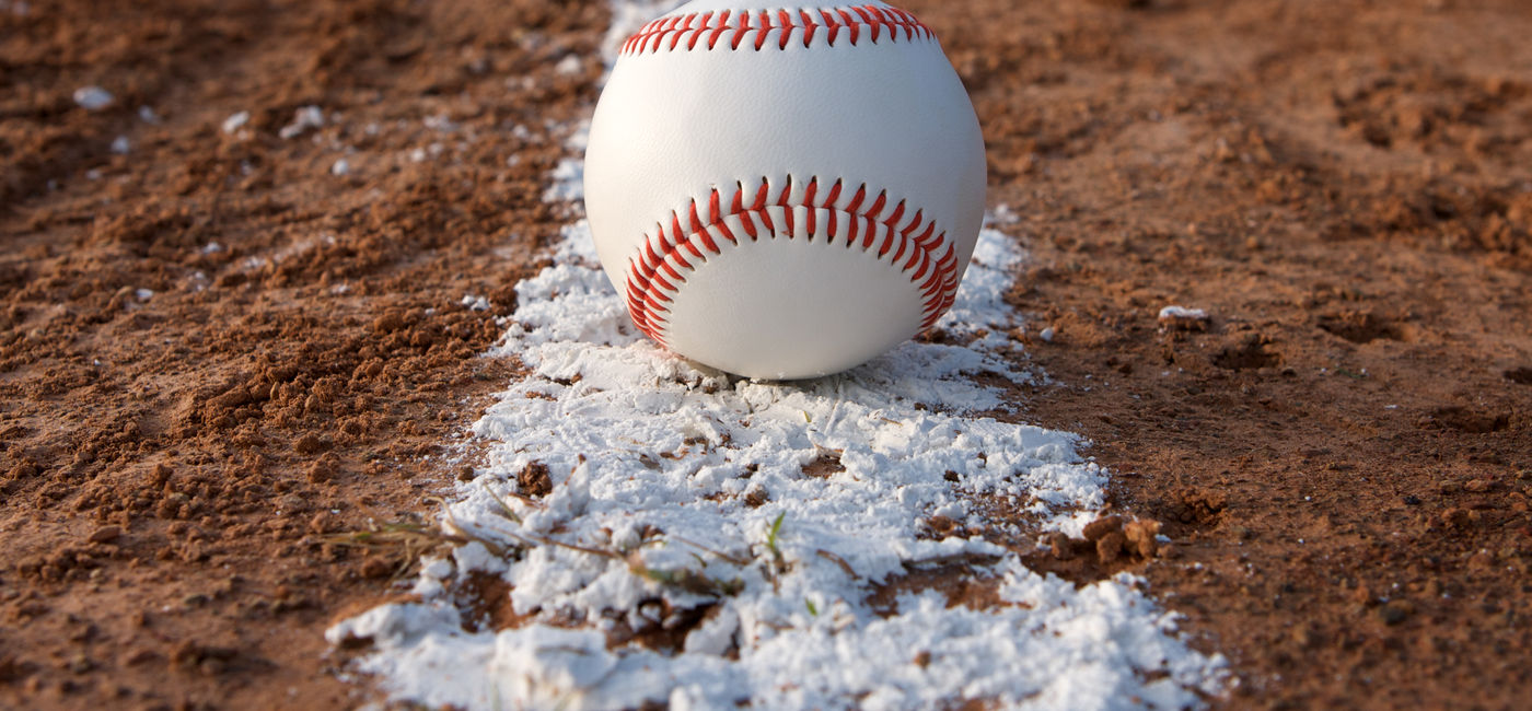Image: Baseball on a field. (Photo Credit: 33ft / Adobe Stock)