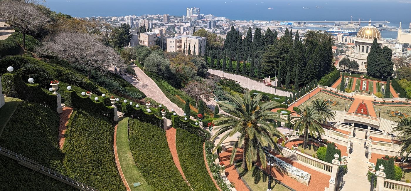 Image:  Bahá'í Gardens with Haifa, Israel in the background (Photo Credit: Claudette Covey)