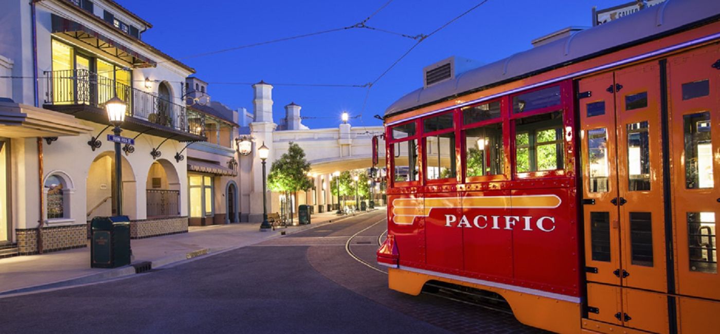 Image: Red Trolley Car driving down streets in Disney California Adventure. (photo via Walt Disney World Resort)