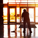 Janitor cleaning a hotel lobby