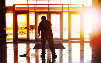 Janitor cleaning a hotel lobby